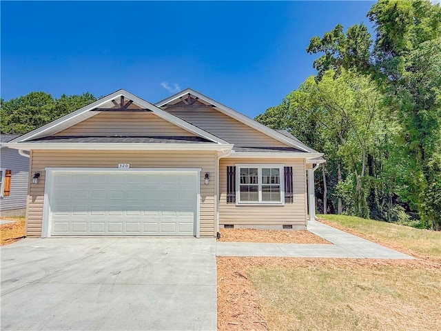 320 Code Cir, Seneca, SC 29678 - view of front of home featuring crawl space, concrete driveway, and a garage