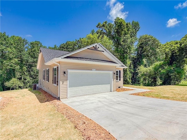 320 Code Cir, Seneca, SC 29678 - view of front of house with a front yard, central AC unit, an attached garage, concrete driveway, and a shingled roof