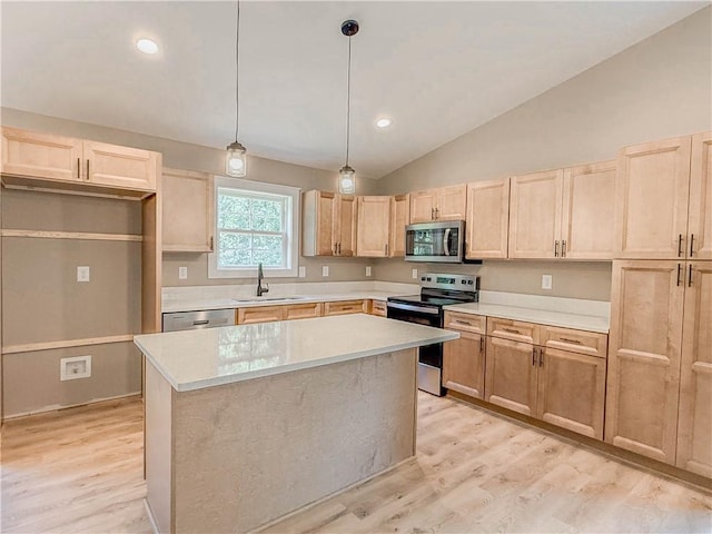320 Code Cir, Seneca, SC 29678 - kitchen featuring appliances with stainless steel finishes, light brown cabinetry, a sink, lofted ceiling, and light countertops