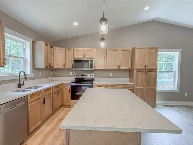320 Code Cir, Seneca, SC 29678 - kitchen featuring stainless steel appliances, a sink, light brown cabinets, lofted ceiling, and recessed lighting