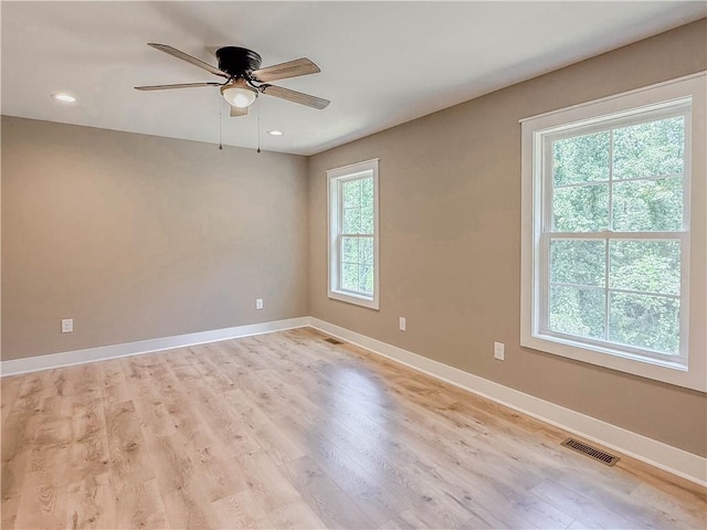 320 Code Cir, Seneca, SC 29678 - empty room featuring light wood-type flooring, ceiling fan, baseboards, and recessed lighting