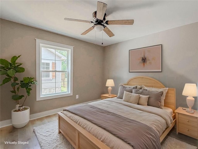 320 Code Cir, Seneca, SC 29678 - bedroom with wood finished floors, baseboards, and a ceiling fan
