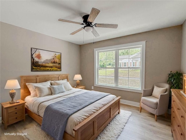 320 Code Cir, Seneca, SC 29678 - bedroom featuring light wood finished floors, baseboards, and ceiling fan