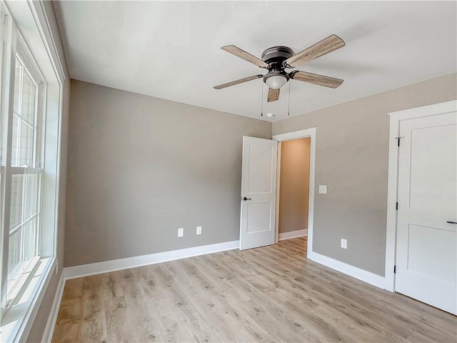 320 Code Cir, Seneca, SC 29678 - unfurnished bedroom featuring baseboards, light wood finished floors, and a ceiling fan