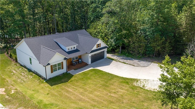 bird's eye view with a forest view