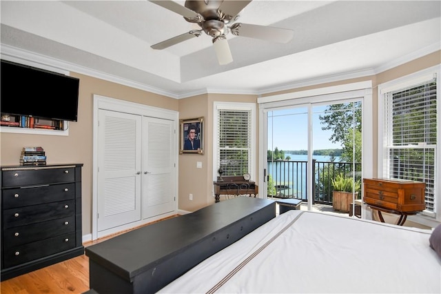 515 Beacon Shores Dr, Seneca, SC 29672 - bedroom with access to outside, crown molding, a water view, light wood-style flooring, and ceiling fan