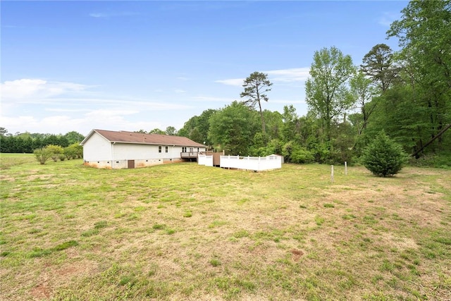 view of yard featuring a deck