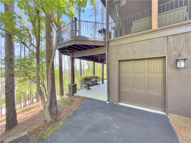 garage featuring driveway