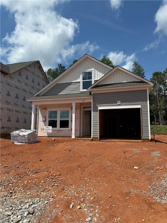 212 Brown Cir Lot 28, Easley, SC 29642 - property under construction with a garage, board and batten siding, and driveway
