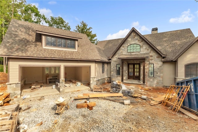 909 Woodlake Way, Salem, SC 29676 - view of front of property with stone siding, roof with shingles, french doors, and a chimney