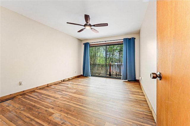 243 Beaver Lodge Rd, Hartwell, GA 30643 - unfurnished room with wood finished floors, baseboards, and ceiling fan