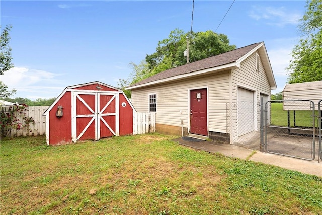 view of shed featuring fence
