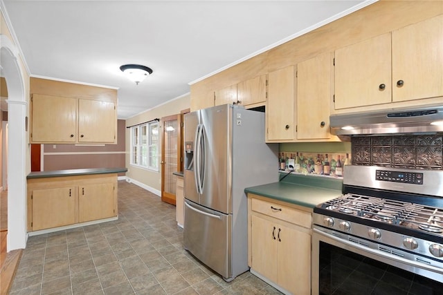 kitchen with under cabinet range hood, stainless steel appliances, and light brown cabinetry