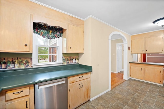 kitchen featuring light brown cabinets, baseboards, and stainless steel dishwasher