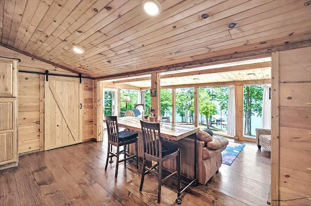 dining area with dark wood-style floors, plenty of natural light, wood ceiling, and lofted ceiling