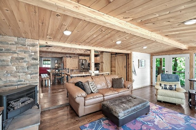 living room featuring wooden ceiling, beamed ceiling, french doors, and hardwood / wood-style flooring
