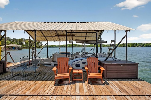 view of dock with boat lift and a water view