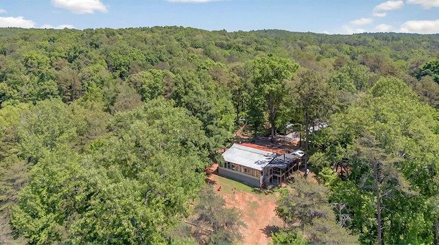 drone / aerial view with a forest view