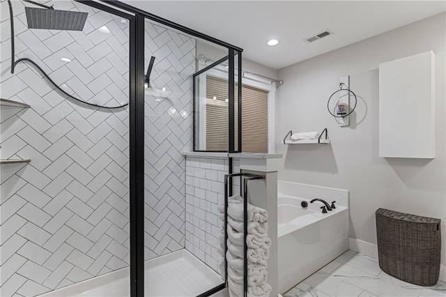 604 Robin Hood Ln, Anderson, SC 29621 - full bathroom featuring visible vents, marble finish floor, a garden tub, and a shower stall