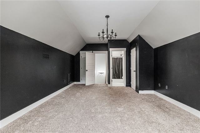 604 Robin Hood Ln, Anderson, SC 29621 - additional living space with carpet floors, baseboards, vaulted ceiling, and a chandelier