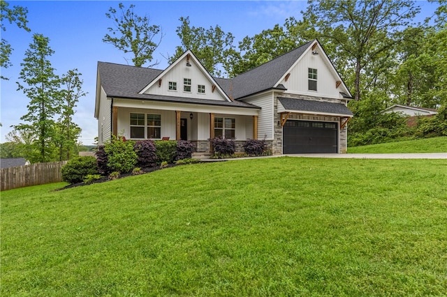604 Robin Hood Ln, Anderson, SC 29621 - craftsman-style house with a porch, a garage, a front lawn, and fence