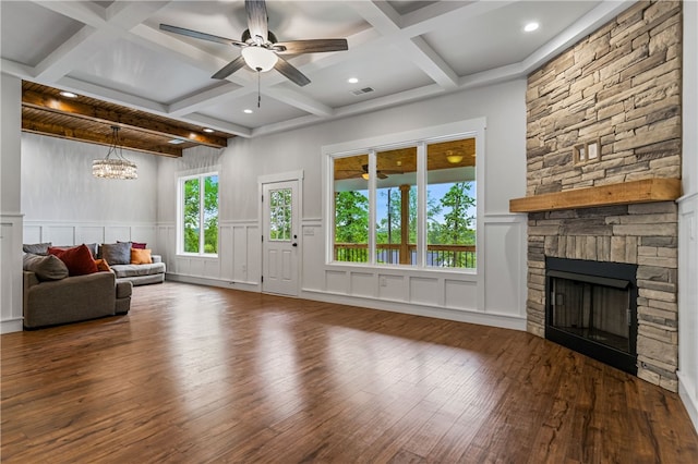 604 Robin Hood Ln, Anderson, SC 29621 - living room featuring a decorative wall, a stone fireplace, hardwood / wood-style floors, visible vents, and coffered ceiling