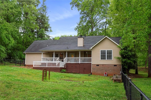 712 Sunny Shore Ln, Anderson, SC 29621 - rear view of house with a chimney, fence, a yard, and crawl space