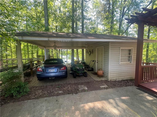view of vehicle parking with a carport