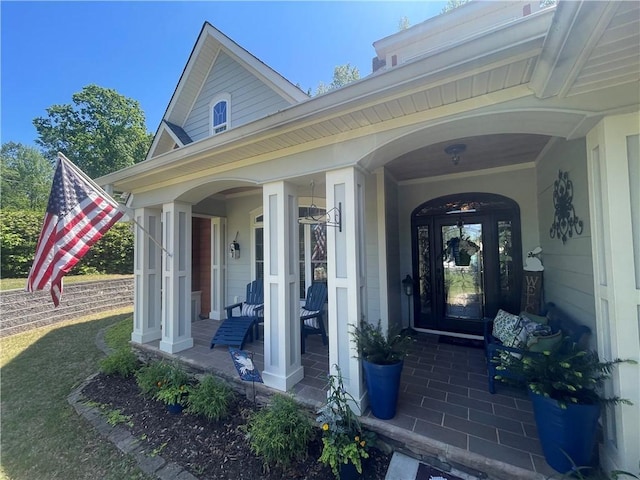doorway to property featuring a porch