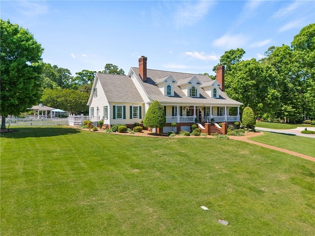 cape cod-style house with a porch, fence, a chimney, and a front lawn