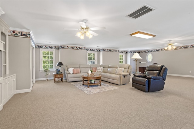 living room featuring ceiling fan, carpet flooring, and visible vents