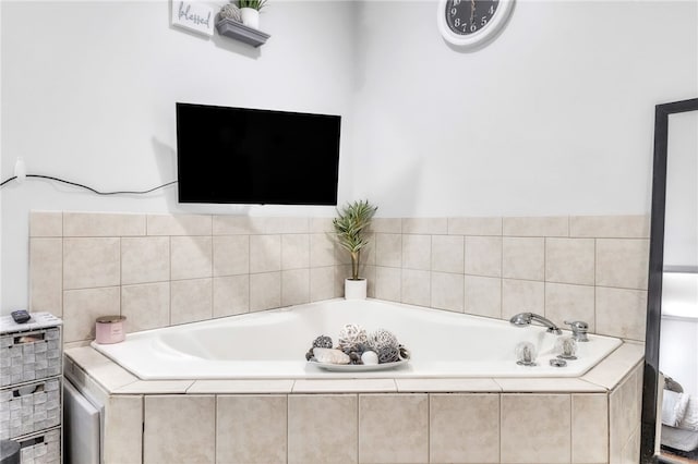 full bath with a garden tub