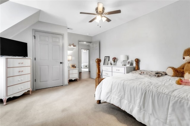 bedroom featuring light colored carpet and ceiling fan