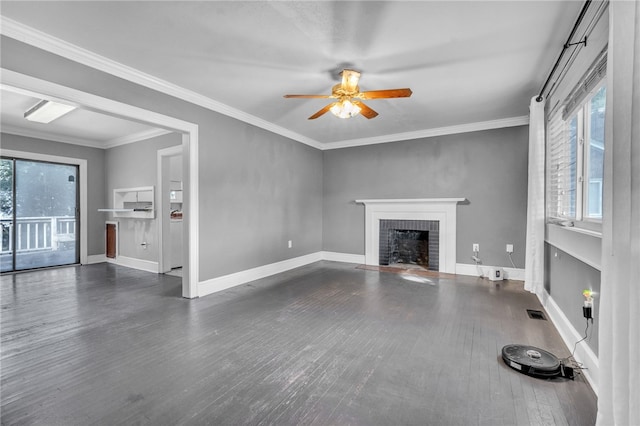 322 Whitehall Rd, Anderson, SC 29625 - unfurnished living room with crown molding, a brick fireplace, wood finished floors, baseboards, and a ceiling fan