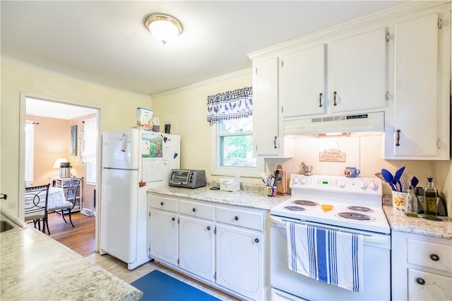 kitchen featuring light wood finished floors, white appliances, light countertops, white cabinetry, and under cabinet range hood