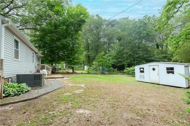 839 Crouch Dr, Pendleton, SC 29670 - view of yard featuring a storage unit, central air condition unit, an outbuilding, and a deck