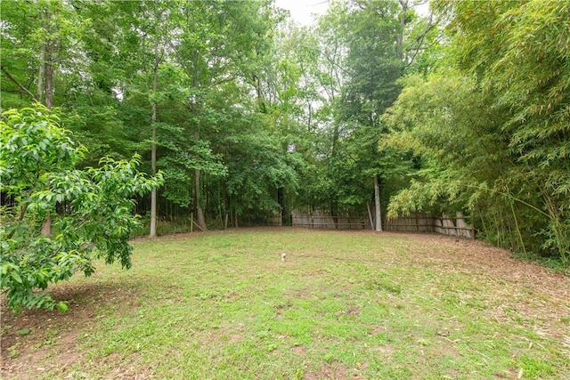 view of yard with fence