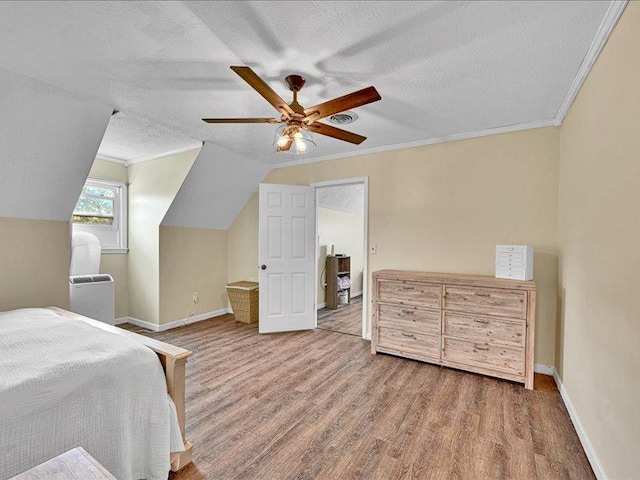 415 Van Martin Rd, Anderson, SC 29621 - bedroom with a ceiling fan, a textured ceiling, visible vents, wood finished floors, and baseboards