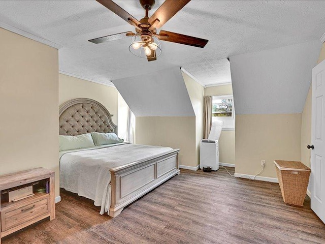 415 Van Martin Rd, Anderson, SC 29621 - bedroom with a ceiling fan, a textured ceiling, vaulted ceiling, and wood finished floors