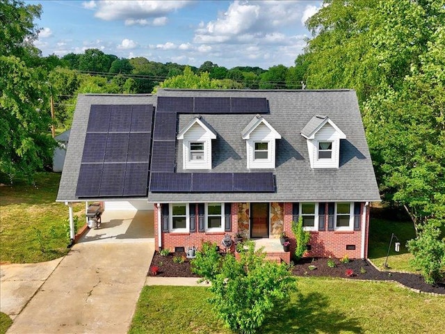 415 Van Martin Rd, Anderson, SC 29621 - new england style home with brick siding, a front lawn, and solar panels