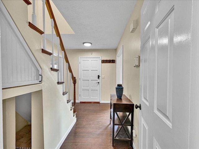 415 Van Martin Rd, Anderson, SC 29621 - interior space with stairs, dark wood-style flooring, baseboards, and a textured ceiling