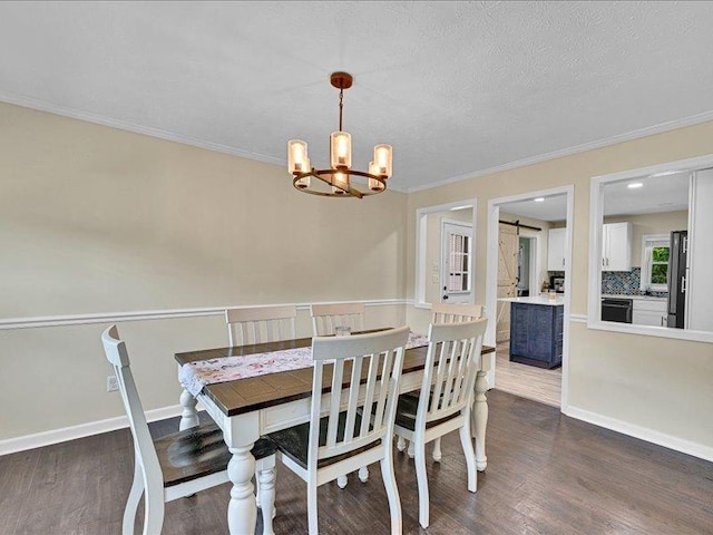 415 Van Martin Rd, Anderson, SC 29621 - dining space featuring baseboards, a chandelier, ornamental molding, and wood finished floors