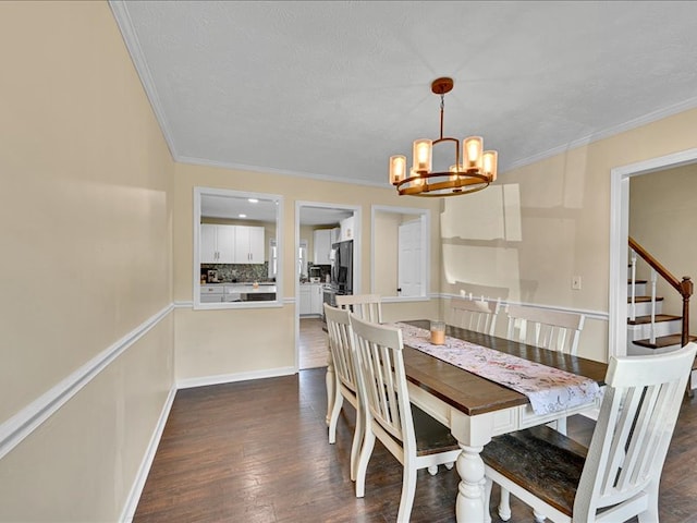 415 Van Martin Rd, Anderson, SC 29621 - dining space featuring crown molding, stairway, dark wood-type flooring, and a notable chandelier