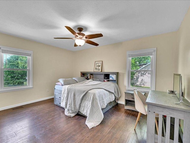 415 Van Martin Rd, Anderson, SC 29621 - bedroom featuring baseboards, multiple windows, dark wood-style floors, and visible vents