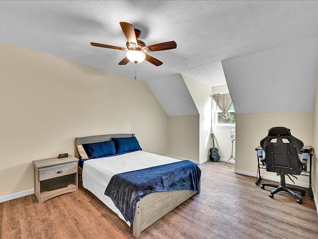 415 Van Martin Rd, Anderson, SC 29621 - bedroom with baseboards, a textured ceiling, and wood finished floors