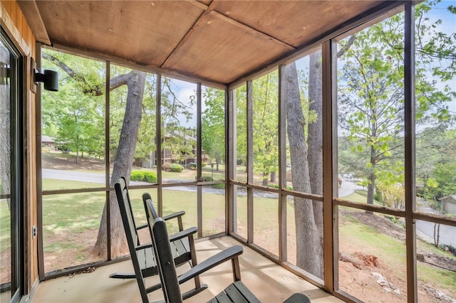 unfurnished sunroom featuring a wealth of natural light