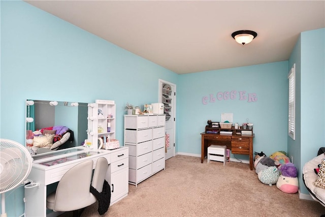 bedroom featuring light colored carpet