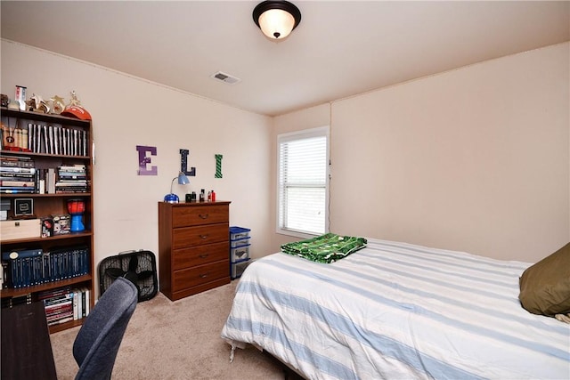 carpeted bedroom with visible vents