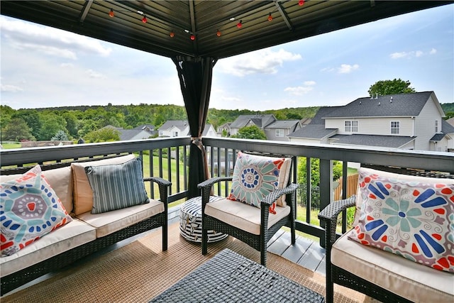 balcony featuring a residential view and an outdoor hangout area