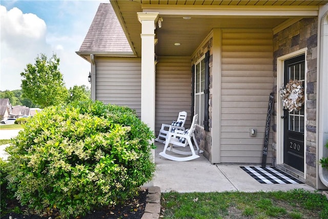 property entrance featuring covered porch